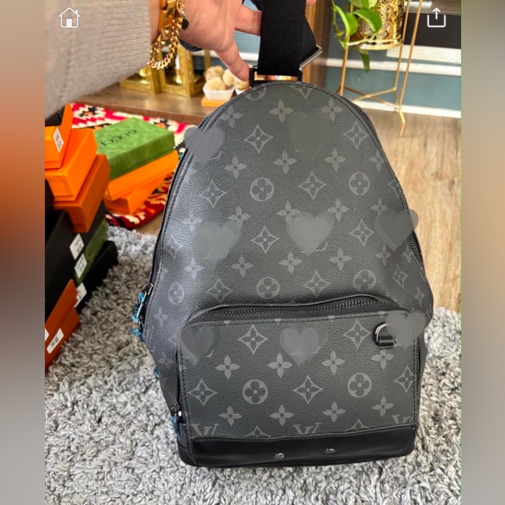 Monogram-Pattern Black Backpack with Front Pocket